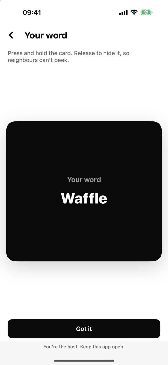 The secret word card held open, showing the word Waffle